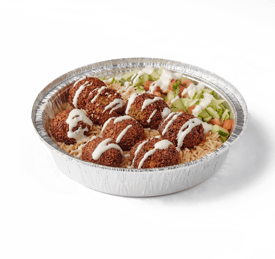 Fresh Falafel Over Rice Platter with crispy falafel and salad