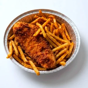 Crispy battered fish served with golden French fries at Halal Crispy Bites in Baltimore