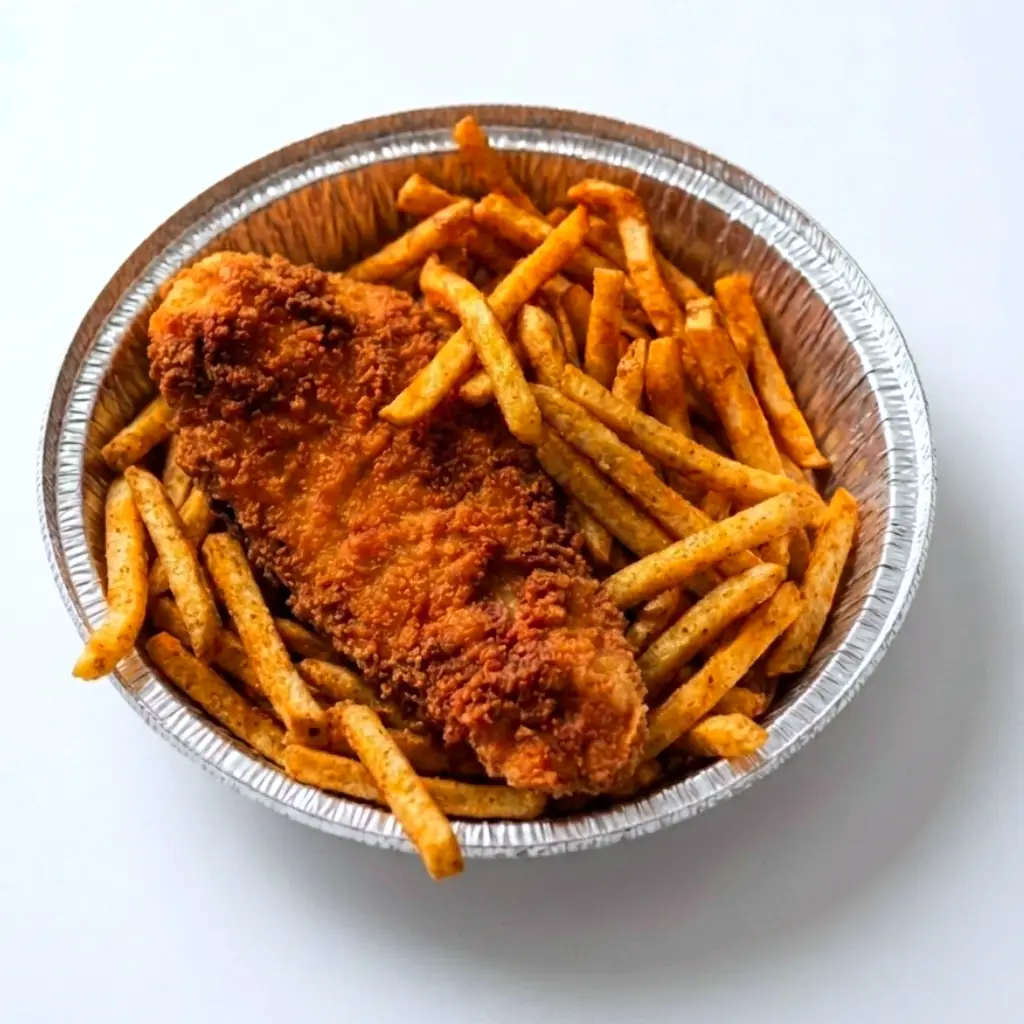 Crispy battered fish served with golden French fries at Halal Crispy Bites in Baltimore