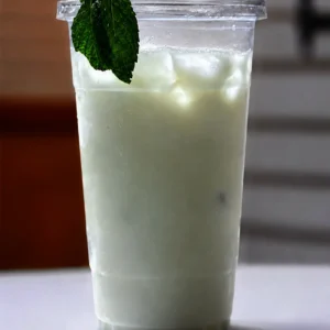Ice-cold Sweet Mint Lassi made with creamy yogurt and fresh mint at Halal Crispy Bites in Baltimore