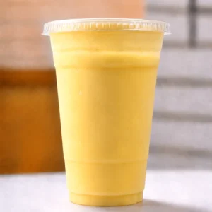 Sweet Mango Lassi made with ripe mangoes and fresh yogurt at Halal Crispy Bites in Baltimore